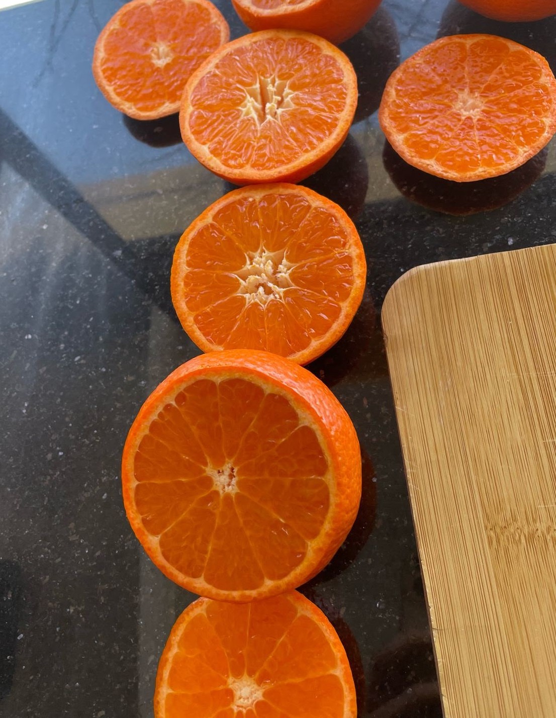 Mandarin sliced open for quality inspection